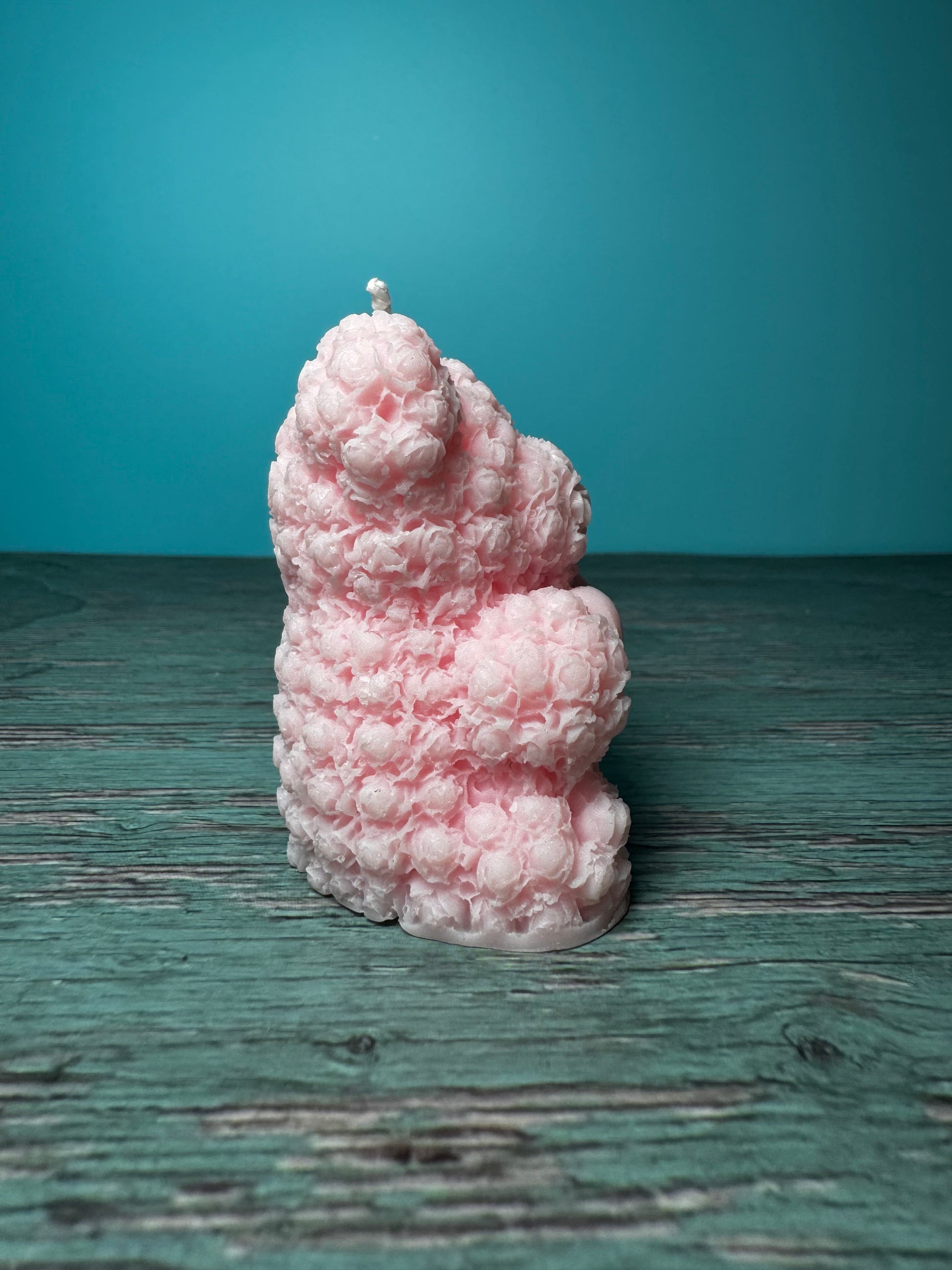 candela orsetto rosa vista di lato