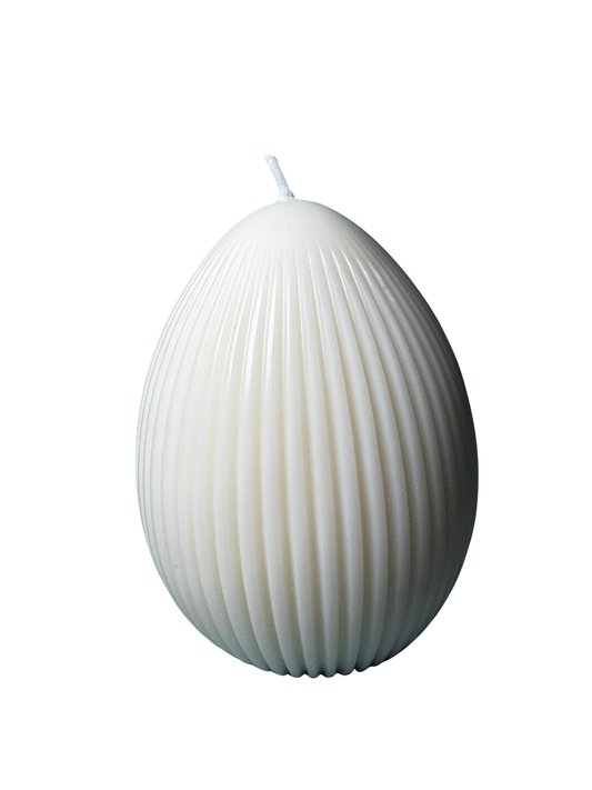 candela bianca in cera di soia a forma di uovo a righe