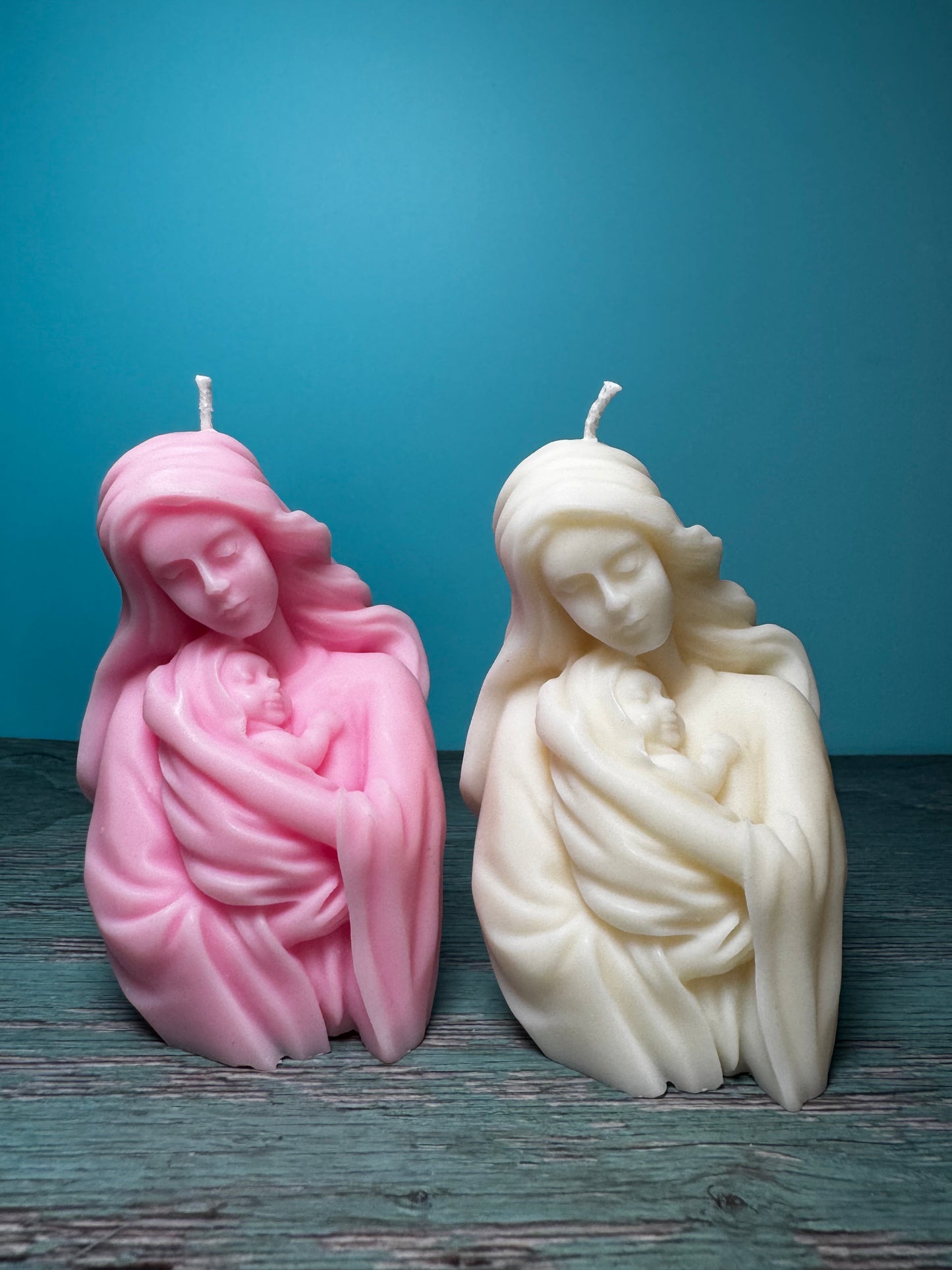 candele bomboniere madonna con gesù in braccio di colore rosa e bianco